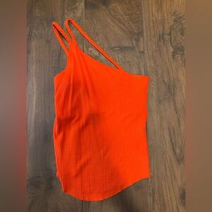 The Range Vibrant Orange One-Shoulder Top